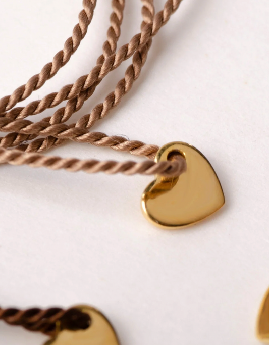 CHARLOTTE WOONING ARMBAND HART ONDER DE RIEM